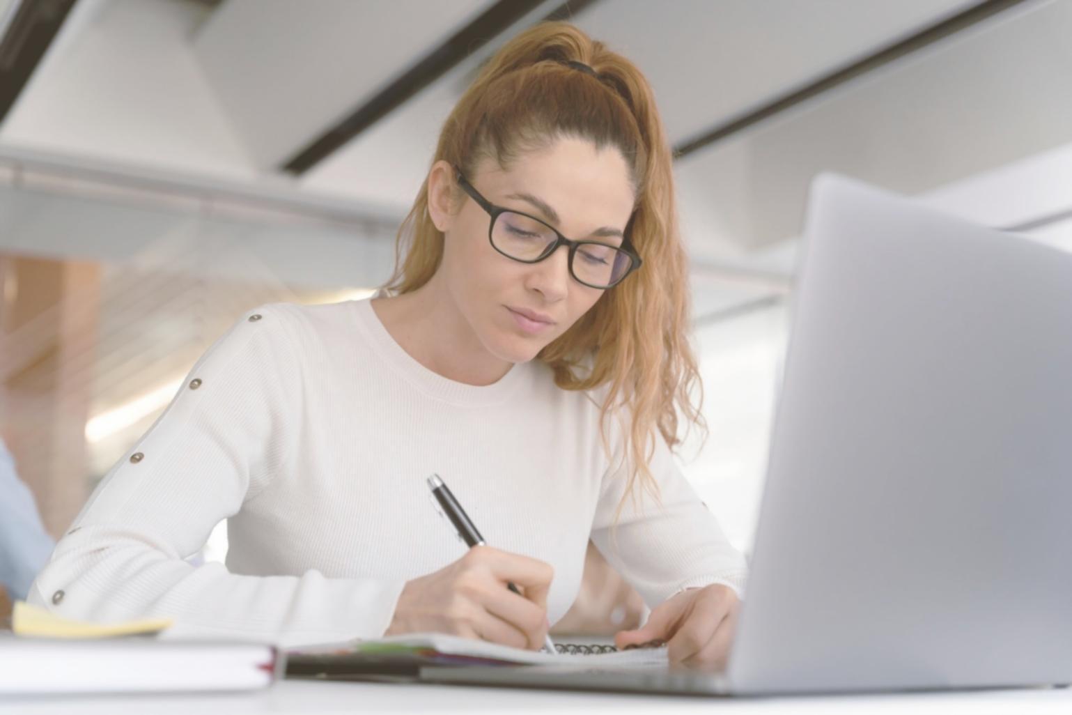 Person using tablet to review financial decision-making tools and budget categories
